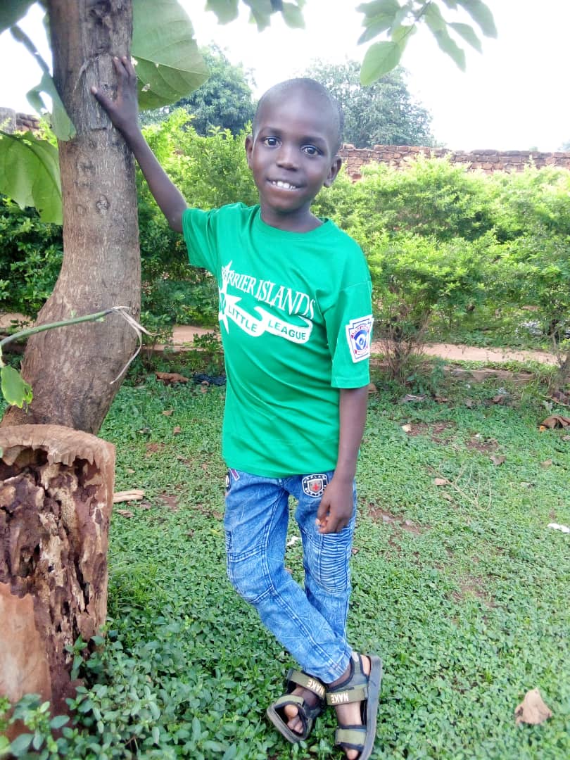 Innocent smiling after years of care through FVKids